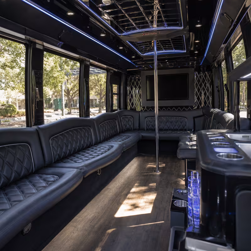 Friends laughing during a Fort Myers party bus celebration