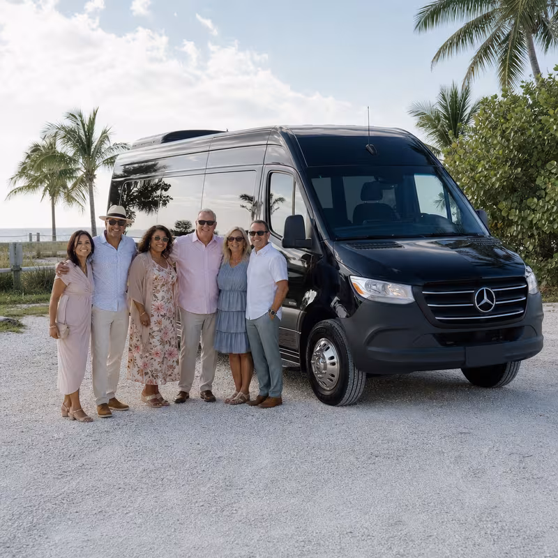 Group beside a Mercedes Sprinter limo from the Fort Myers fleet
