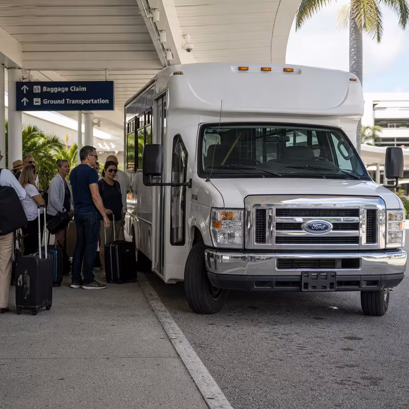 Black Mercedes Sprinter van staged for an Fort Myers Airport Transportation group