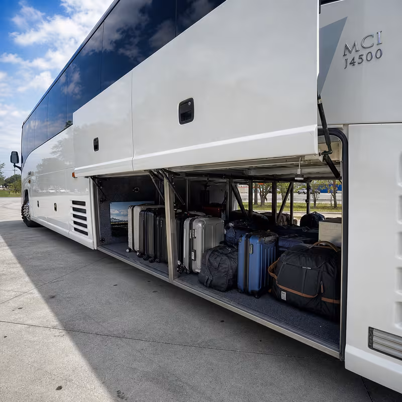 Party bus interior with wraparound leather seating and LED lighting in Fort Myers