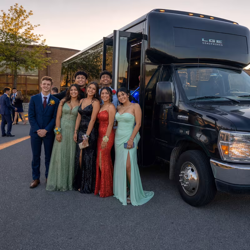 Group boarding a white charter bus for Prom & Homecoming Transportation transportation in Fort Myers