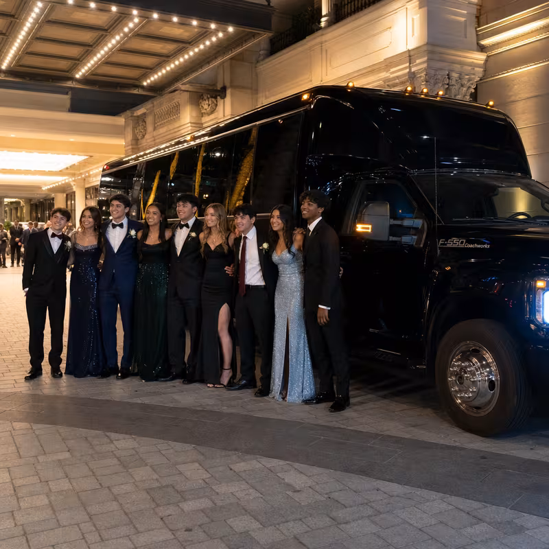 Party bus interior with wraparound leather seating and LED lighting in Fort Myers